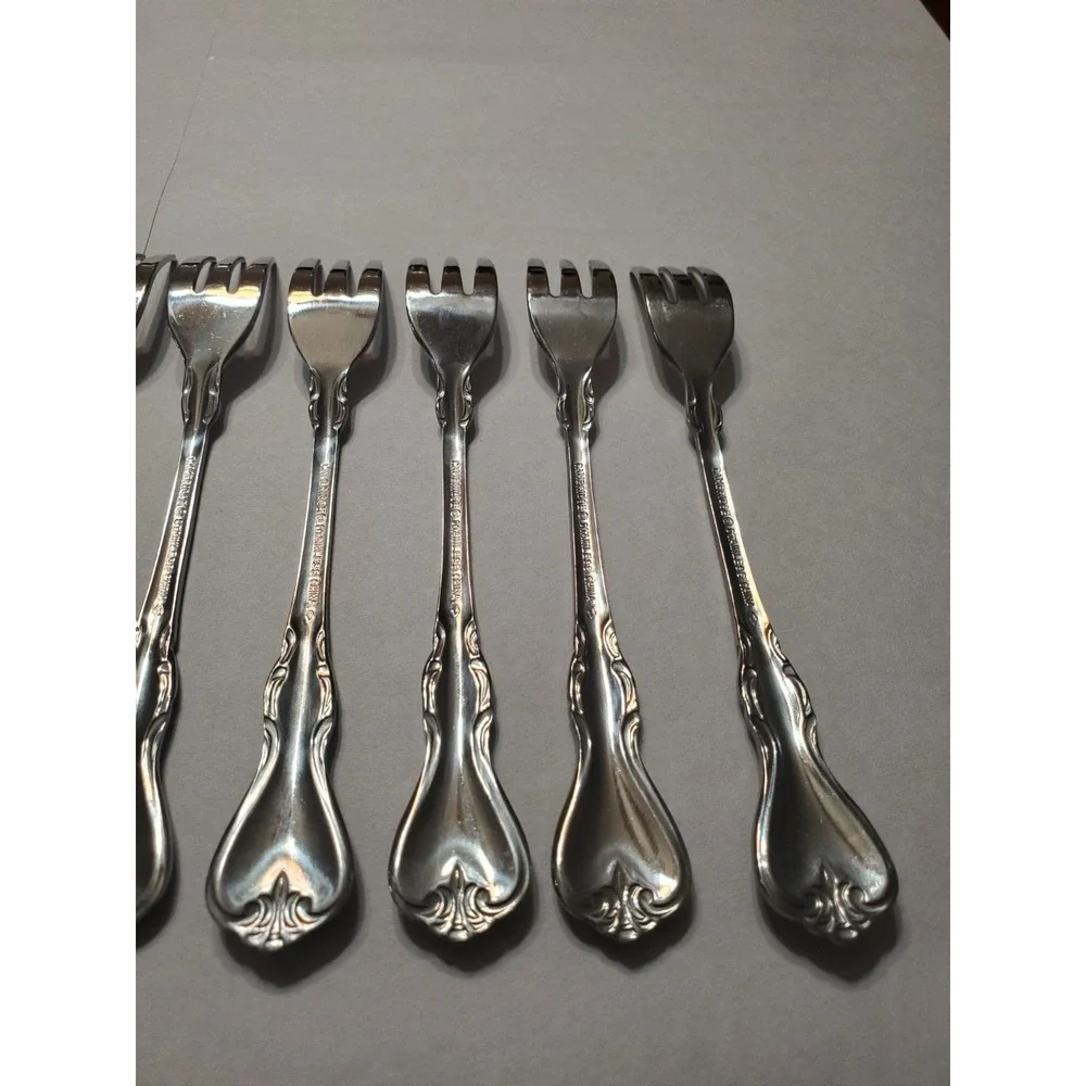 Melinda by CAMBRIDGE Silver Stainless Glossy Scroll Outline (12) Cocktail Spoons